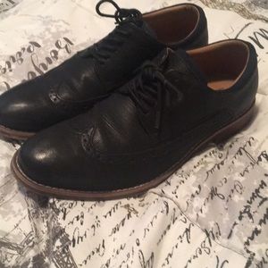 Men’s size 8 1/2 black dress shoes.